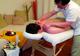Massage-bien-être californien aux huiles sur table chauffée à domicile - Hauts-de-Seine